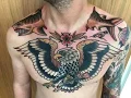 Traditional eagle chest piece tattooing