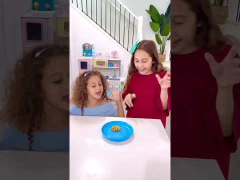 Sierra and Rhia sharing cookies with each other