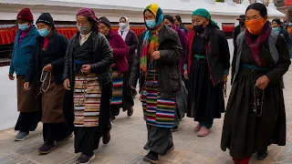 why are they walking around this stupa buddhist rituals in nepal