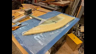 Laminating rudder, port side, laminating deck house, port side.