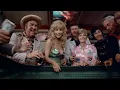 Stella Stevens busty in a low-cut green dress Las Vegas Lady 1975