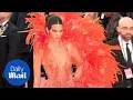 Download Lagu Kendall Jenner stuns in orange feathers at 2019 Met Gala