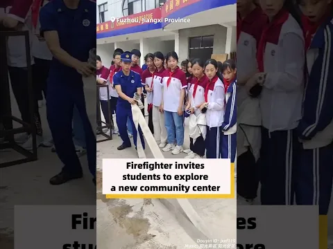 Firefighter invites students to explore a new community center