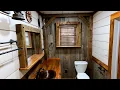 Rustic bathroom build with accent posts