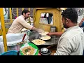 Download Lagu 50/- Rs Crispy Paratha with Chickpeas and Tea dip. Healthy Saag Paratha recipe | Street food Lahore