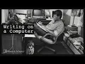 Stephen King in Conversation with John Grisham Writing on a Computer