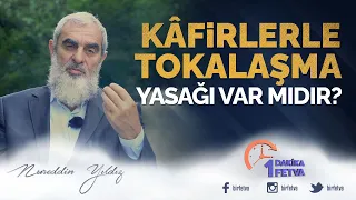 Kâfirlerle tokalaşma yasağı var mıdır?