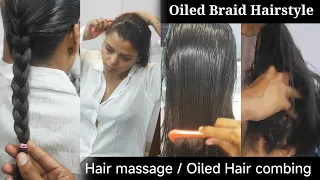 heavy hair oiling and sleek oiled hair combing by man at home oiled braid hairstyle hard massage
