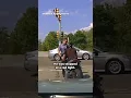 Motorcyclist drives state trooper into oncoming traffic