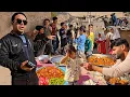 Lagu Distribution of delicious food among the village children by Mahmoud and Aghil