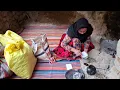 A cavewoman's battle with a mountain of rock and dirt! A struggle for survival