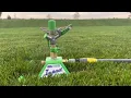 Me using the Impact Sled Sprinkler in my backyard