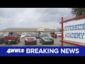 Police arrest janitor at St John Parish school for locker room cameras