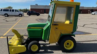 300 John Deere with cab snowblower