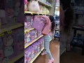Buying all the Squishmallows you can carry in 10 Seconds