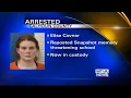 Woman arrested after reposting school threat in Calhoun County