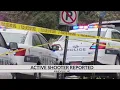 Man dead deputy hurt after shooting outside courthouse in Asheville sheriff says