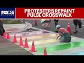 Download Lagu Defiant protesters repaint Pulse Memorial crosswalk in rainbow colors