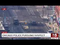 Driver plows through gate in HIGH-SPEED police chase on Chicago s South Side