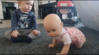 Beby Playing with Luvabella Dolls