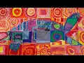 Collaborative Mural with Warm and Cool Colors and Concentric Shapes
