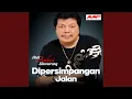 Di Persimpangan Jalan