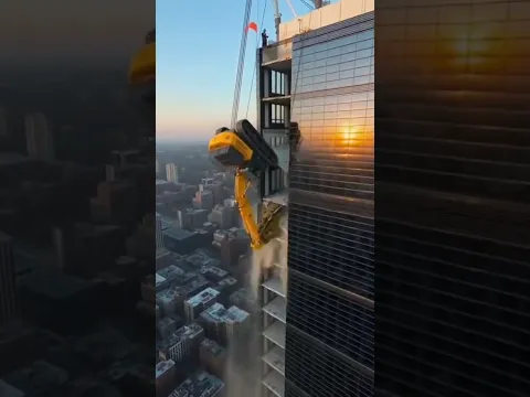 Demolishing a high-rise building with a forklift