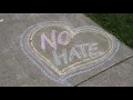 Sidewalks in Honeoye Falls chalked with messages of peace