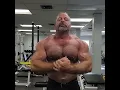 Muscle bear muscle daddy flexing shirtless at the gym