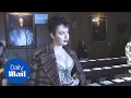 Charli XCX shows off her generous cleavage in corset - Daily Mail