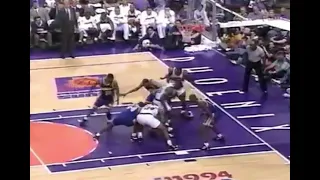 Charles Barkley grabs the rebound against 7 players