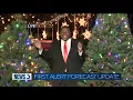 Meteorologist Chris Reece celebrates this morning s snow