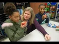 Students staff enjoying first taste of Breakfast in the Classroom program