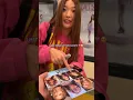 Yoonchae signing her SIS EP Photo Card KATSEYE