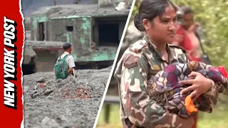 Survivors of Deadly Nepal Mudslide Wander Somberly Through Their Once Vibrant Street