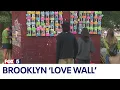 Brooklyn brick wall becomes hotspot for singles seeking love in NYC