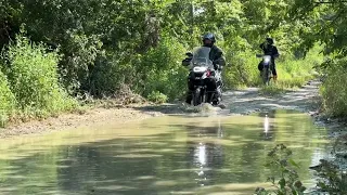 Austin and Matt clearing the last nasty mud pit near Shiro Tx