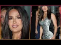 Salma Hayek 57 is always the brunette bombshell in a busty optical illusion dress as she arrives