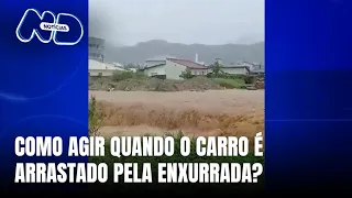 Bombeiros orientam motoristas sobre o que fazer quando o veículo é levado pela enxurrada