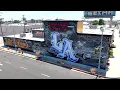 Wall painting on The Players Club building done by Mister Cartoon.