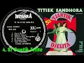 Download Lagu 052. Titiek Sandhora - Band 4 Nada \