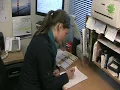 Math Teacher Correcting Students Homework Using MiniPLOT Graph Paper