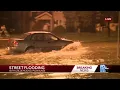 Cars spotted driving over flooded streets on Bluemound Road