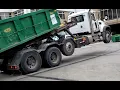 Crazy roll-off truck driver