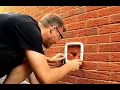 A Day fitting Cat Flaps into Windows and Walls