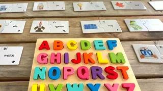 Enjoying Alphabet Puzzle Pieces Outdoors With Scenic Outdoor Views All Around