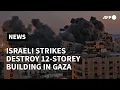 Download Lagu Israeli air strikes destroy 12-storey building in Gaza City | AFP