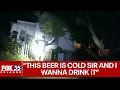 Florida man cracks open beer as they have guns drawn at him
