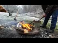 T-bone Steak with Vegetables Cooking on the Sadj