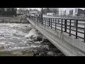 Water rushes through dam in Alpena